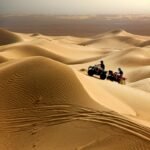 Experience thrilling quad biking across Merzouga's stunning desert dunes.