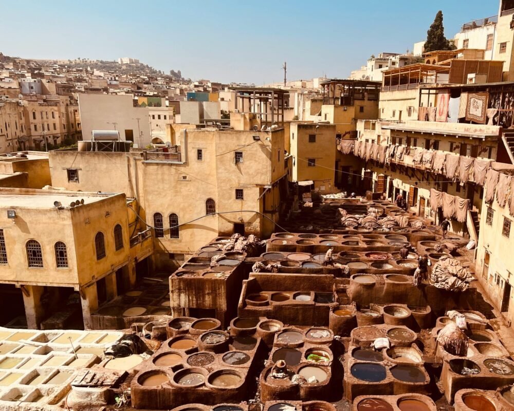 Aerial view of ancient leather tanneries in Fez, showcasing traditional Moroccan craftsmanship.